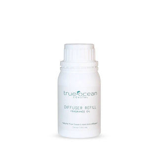 A white plastic bottle of True Ocean Coastal Diffuser Refill Fragrance Oil with a white ribbed cap, shown on a clean white background.