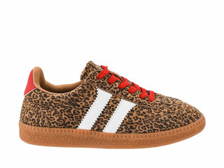 A low-top sneaker featuring a brown and black leopard print upper, white side stripes, red laces, and a brown gum sole, shown against a plain white background.