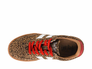 A single low-top sneaker shown from a top-down view on a white background. The shoe features a brown and black leopard print pattern, bright red laces, and white side stripes, with the brand name 'Haggar' visible on the insole.
