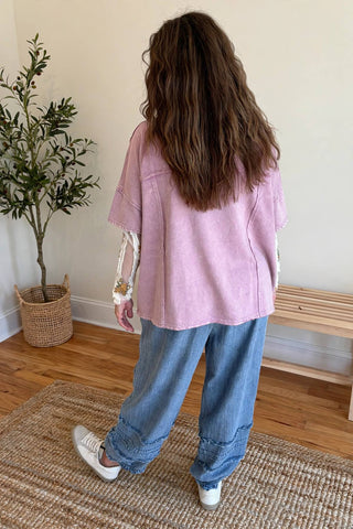 Mauve Easel top with peace sign and sheer sleeves.