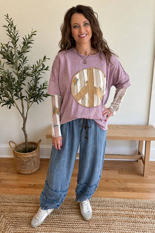 Mauve Easel top with peace sign and sheer sleeves.