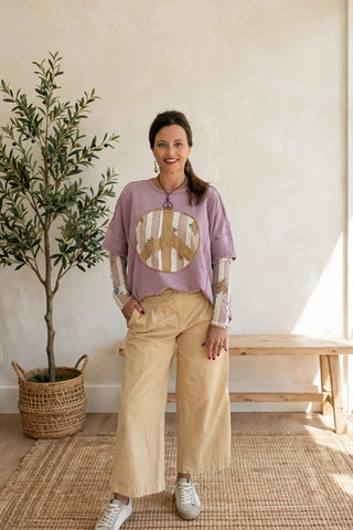 Mauve Easel top with peace sign and sheer sleeves.