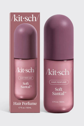 Kit Sch Soft Santal hair perfume bottle and its matching retail box, both in a dusty mauve-purple color, set against a light gray background.
