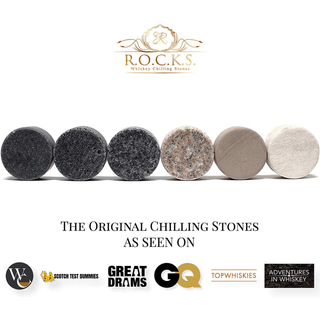 Set of whiskey stones with R.O.C.K.S. logo and brand mentions on a white background