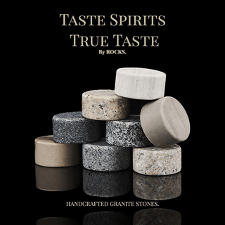 Stack of handcrafted granite stones with 'Taste Spirits True Taste' branding on a black background.